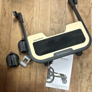 Brand new in box UPPAbaby piggyback Cruz